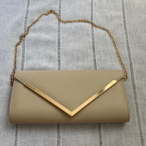 Aldo Handbags - Aldo cream colored crossbody bag with gold embellished.